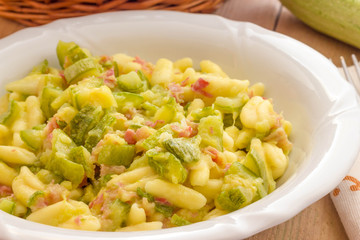 Cavatelli pasta with bacon and courgettes