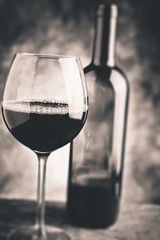 red wine - black and white photo tilt shift selective effect photo
