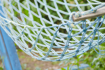 Hammock in the garden. Vacation concept. Rest and relaxation theme