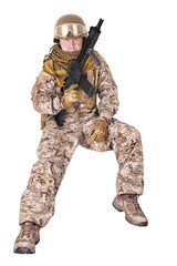 Soldier in uniform, ready to fight. Isolated on white background.