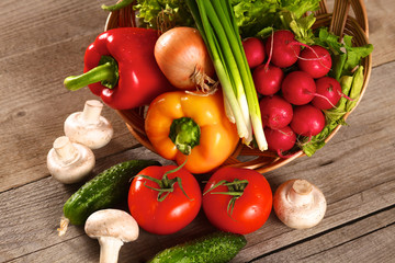 Fresh vegetables on a clean wooden table