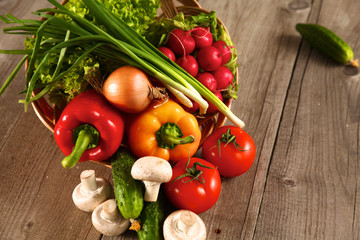 Fresh vegetables on a clean wooden table