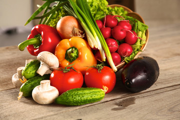 Fresh vegetables on a clean wooden table