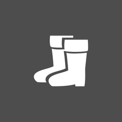 Icono de botas sobre fondo oscuro