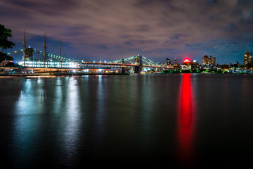 Fototapeta na wymiar Brooklyn Bridge and lower Manhattan at dusk viewed from the Brooklyn Bridge Park in New York City.