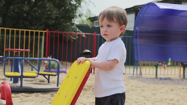 Boy baby stiffens, shit in his pants