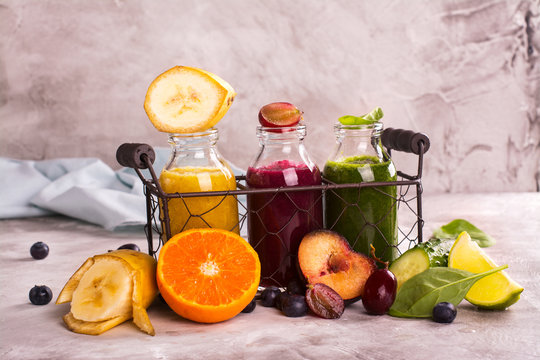 Fresh bright smothies in a wire basket