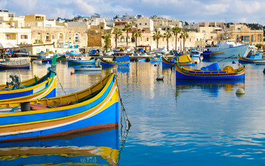 Luzzu famous fishing boats in Marsaxlokk - Malta - obrazy, fototapety, plakaty