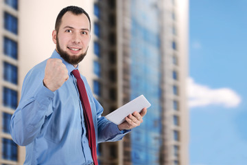 Fototapeta premium Realtor holds tablet