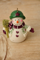 A snowman figurine to decorate a Christmas tree