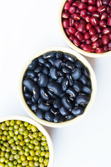 selected focus Red beans , Black beans, Green beans healthy organic seeds in round ceramics cups