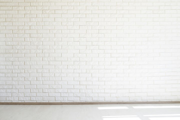 White brick wall, free space, white floor, soft light