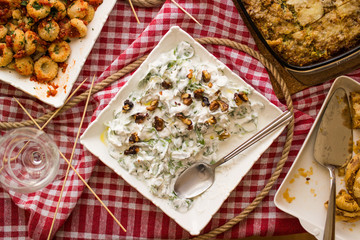 Business woman working with the laptop at cafe's garden.