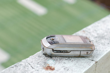 Mobile phone / Abandoned of mobile phone on the wall.