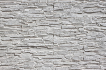 Background from a white stone masonry