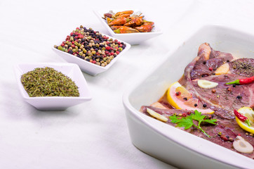 Steaks of red meat , marinated with emulsion of lemon juice and