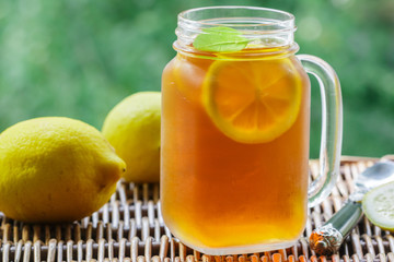 Obraz na płótnie Canvas Summer refreshing drink. Citrus ice tea. Selective focus