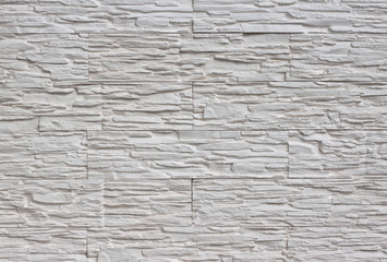Background from a white stone masonry