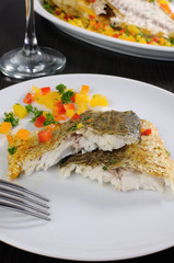 Slices of baked fish Dorado