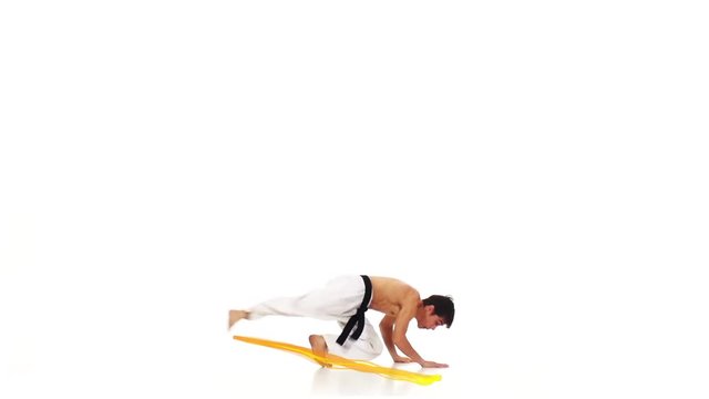 Karate man with a fier line. White background