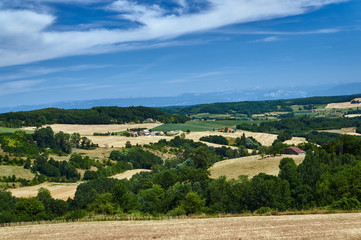 Fototapeta na wymiar Agricultural landscape in the foothills in central France.