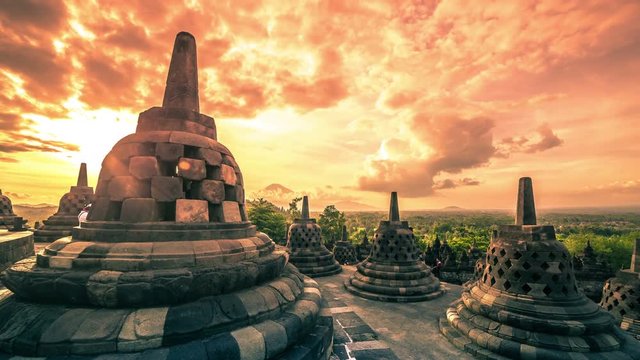 A beautiful sunrise at Borobudur Temple in Indonesia. 4K Timelapse - Java, Indonesia, June 2016.