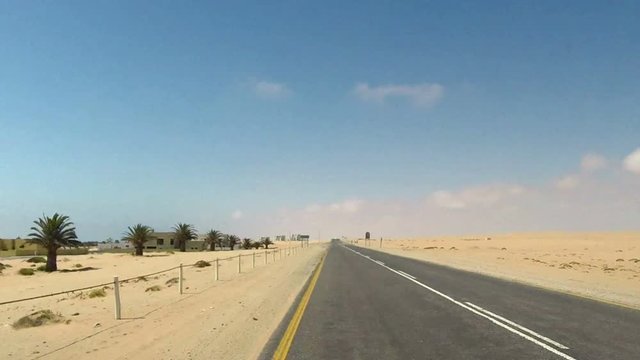Driving on Luderitz to Walvis Bay coastal Road next to Namib Desert, Namibia