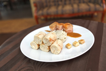 Fototapeta na wymiar Pork belly with cabbage and bread dumplings.