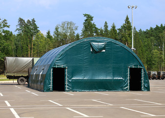 Camouflaged military tent