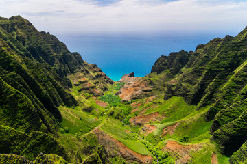 Aerial landscape view of cliffs and green valley, Kauai - 116973605