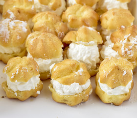 Cream puffs in a white box