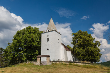 Fototapeta na wymiar Romanesque-Gothic church in Sadok