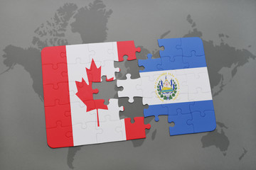 puzzle with the national flag of canada and el salvador on a world map background.