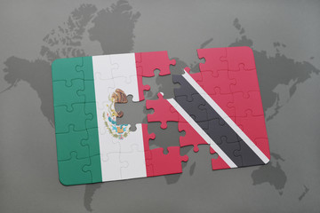 puzzle with the national flag of mexico and trinidad and tobago on a world map background.