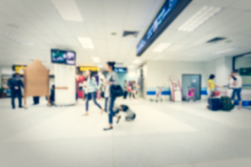 Blurred tourist in the airport