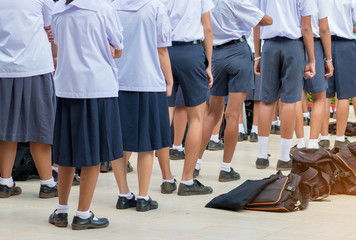 Thailand secondary education students are standing in line in th