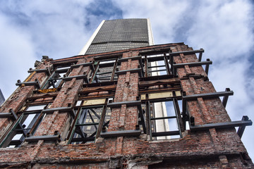 Old building external wall next to new one