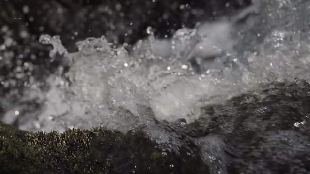 Fresh Clean Spring Water In Slow Motion. This shot really captures the freshness of nature in all its glory.