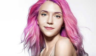 beautiful woman with fluttering hair color pink