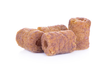 Chocolate flavored puffed corn snacks
