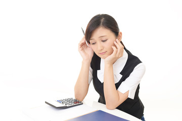 疲れた表情のビジネスウーマン