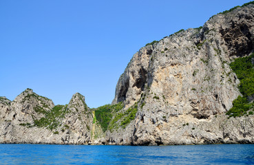 Fototapeta na wymiar Coastal rocks of Capri island - Campania region of Italy, Europe.