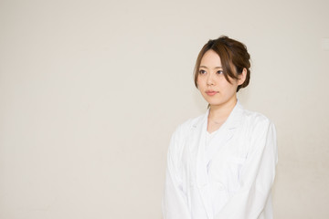 Obraz premium 医療のイメージ（医者・女性・看護婦・研究・白衣）