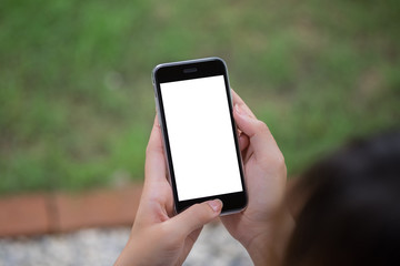 Close up of a woman using smart phone with blank mobile and cup