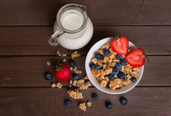 Healthy breakfast. Granola, milk, and blueberries