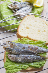 Sandwich Kamut, tapas with sardines, sprats with olives and herb
