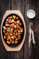 Roasted potato and meat
