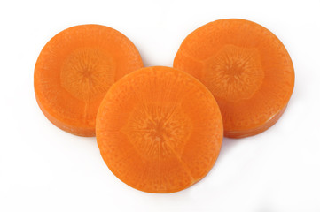 Fresh sliced carrots on white background