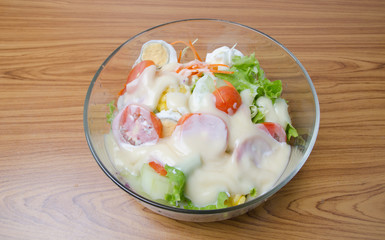 healthy salad  bowl on wood background
