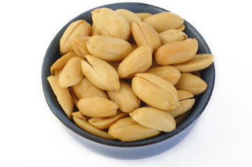 Peeled salted peanuts in bowl